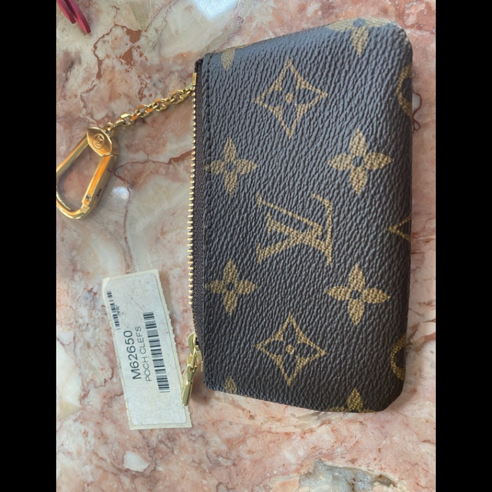 Louis Vuitton monogram key pouch.  Made in France.  New condition.
